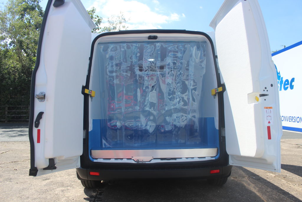 Rear curtains in a Peugeot Partner fridge van