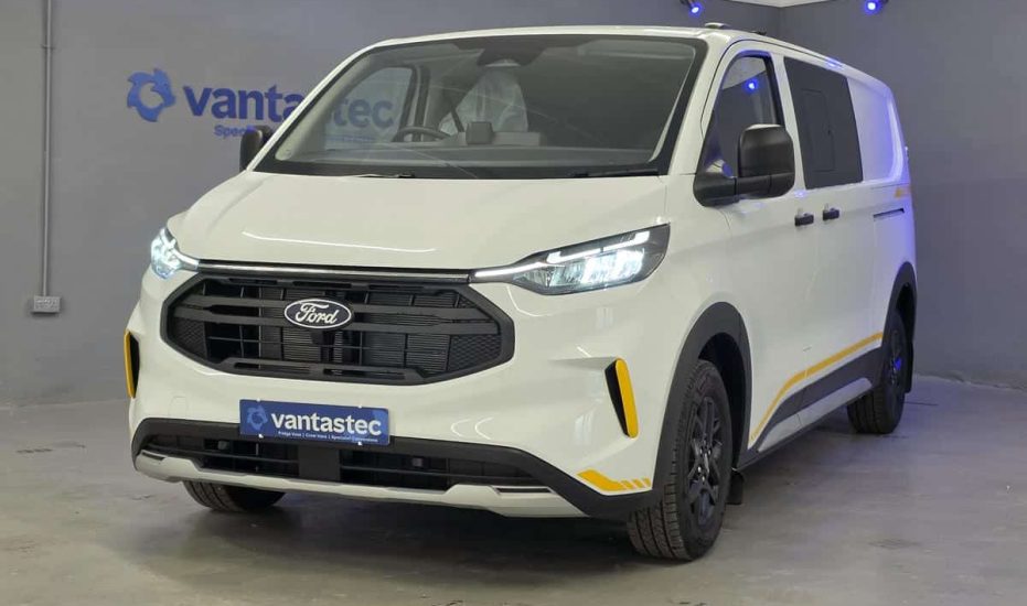 white Ford Transit Custom Trail crew van